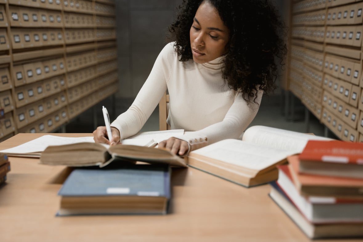 A Woman Researching in the Library